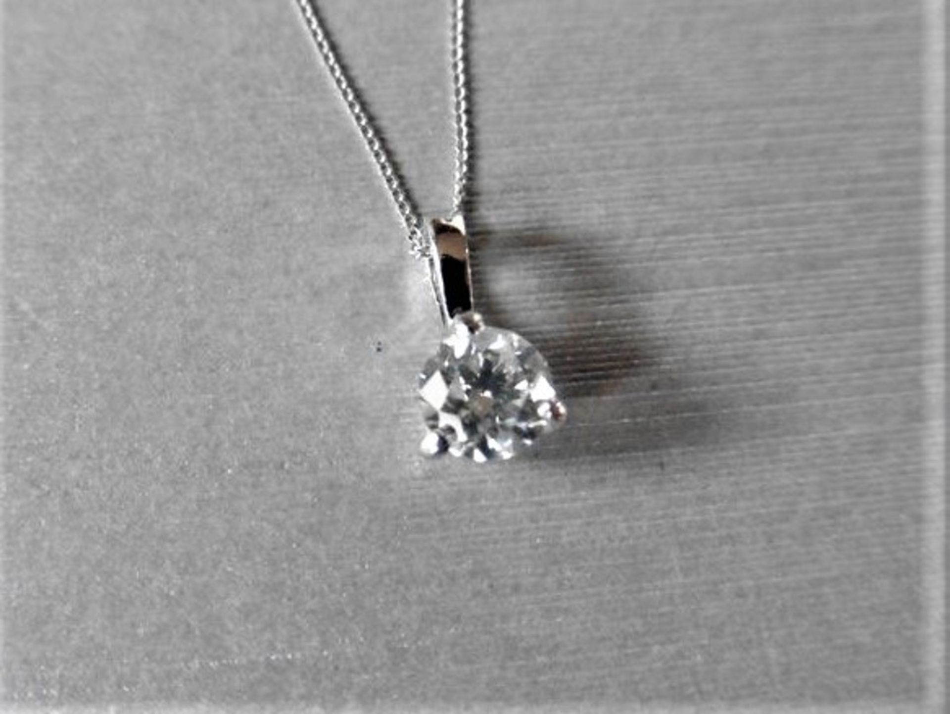 1.01ct diamond solitaire style pendant with a brilliant cut diamond, H colour and si3 clarity. Set