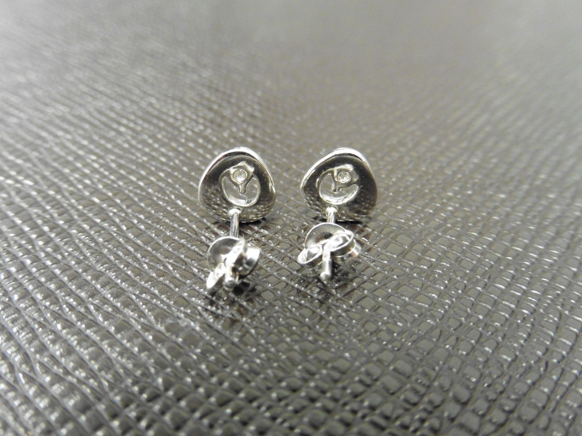 0.12ct diamond earrings set in platinum 950. 2 small brilliant cut diamonds, H/I colourand si2 - Image 3 of 3
