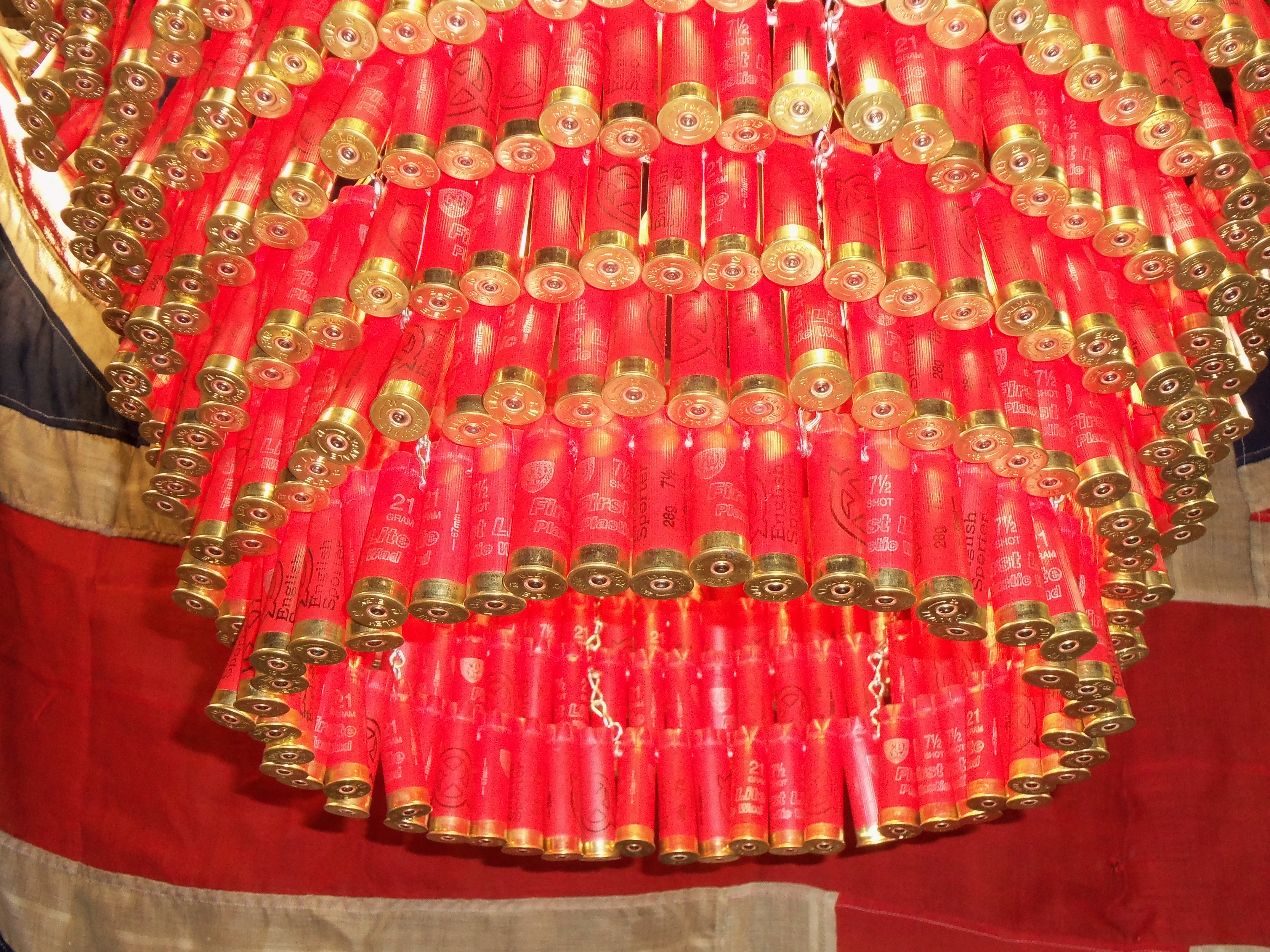 James Day | Red shotgun cartridge chandelier. This is 8 tiers long and approx 70cm wide, handmade - Image 2 of 2