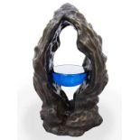 Criss Chaney | Shelter 35cm H x 21cm W x 17cm Deep bronze and cast glass Looking at prehistoric