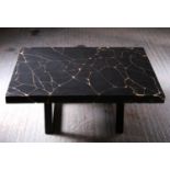 Forge Creative | The Kintsugi coffee table is made from a black concrete slab that has been