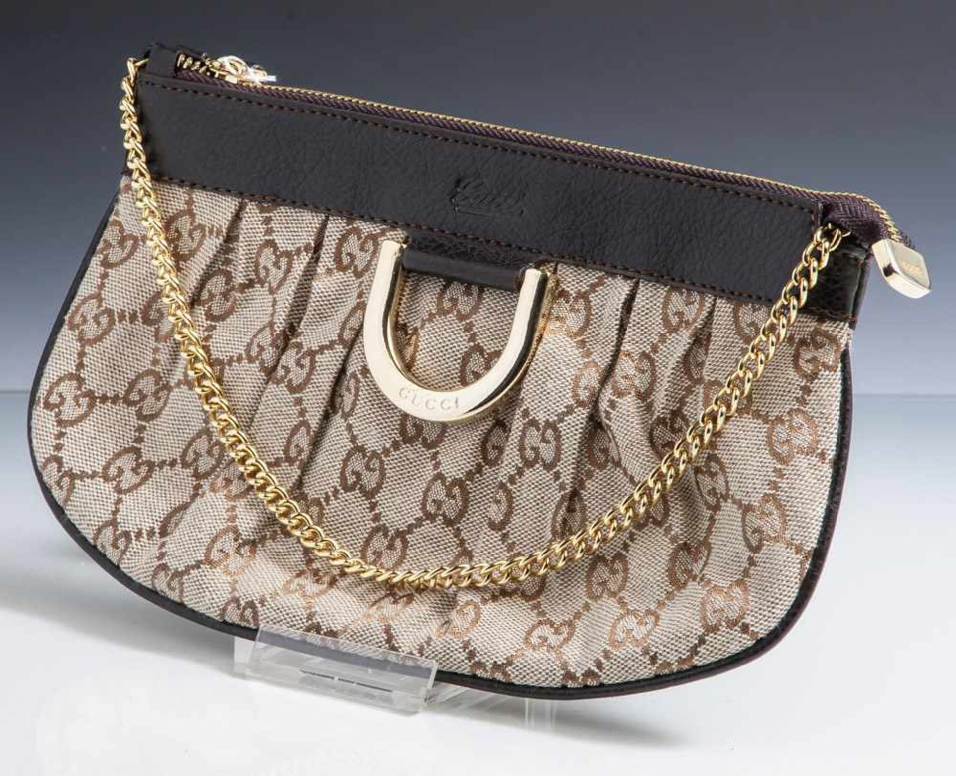 Gucci Handbag, kleine Handtasche aus Stoff u. Leder, Tragegriff Metall vergoldet. 1