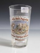 Becherglas "Wilh. Wolfs Magenlikör", farbloses Glas, schauseitig bez. "Das Beste für den Magen ist