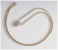 Lange Halskette mit Anhänger, je Gelbgold 585, der Anhänger mit feinem Brillantbesatz. L. ca. 80 cm,