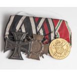 Kleine Ordensspange, bestehend aus: a) Eisernes Kreuz II von 1870, b) Frontkämpferabzeichen 1914/