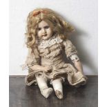 Schildkrötpuppe, Lederkörper, rs. bez. u. num. "15", bewegliche Puppe mit langem blondem Haar und