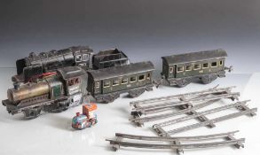 Konvolut Eisenbahnen, Spurbreite 4,5 cm, Blech, Federaufzug, darunter 1 Dampflok, 1 Dampflok mit