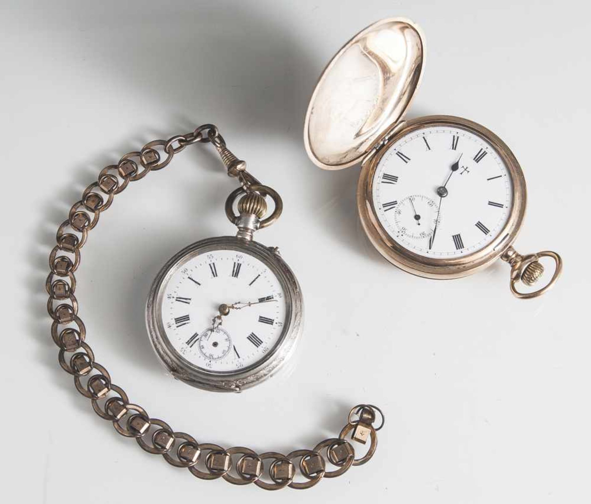 2 Taschenuhren, um 1900, a) Sprungdeckel-Taschenuhr, Walzgold, Ingersoll, Trenton, USA, weißes