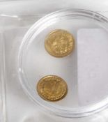 2 Münzen, 0,5 gr. Gold 999/000, 50 Pesos Mexiko 1947, 1 Dollar USA 1900.