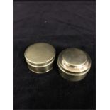 Two silver pill boxes
