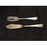 A small silver knife and fork