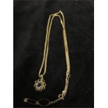 A 9ct gold chain with aquamarine and gold pendant total weight 8.8g