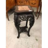 A Darkwood heavily carved Chinese table