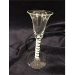 A Georgian wine glass c.1770, bell bowl two ply spiral opaque band outside a pair of spiral tapes,