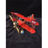 A tinplate model of a plane