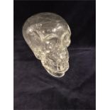 A glass decorative skull