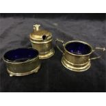 Silver cruets with blue glass liners