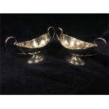 A pair of silver salts (66g)