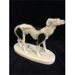 A Goldscheider figure of a Borzoi, Russian Wolfhound, with hairline crack to back paw