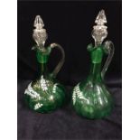 A pair of Georgian decanters in green glass, with snapped pontils