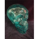 A glass decorative skull