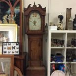 An antique oak, mahogany inlaid 30 hour long case clock with floral painted arch dial Geo Ellis,