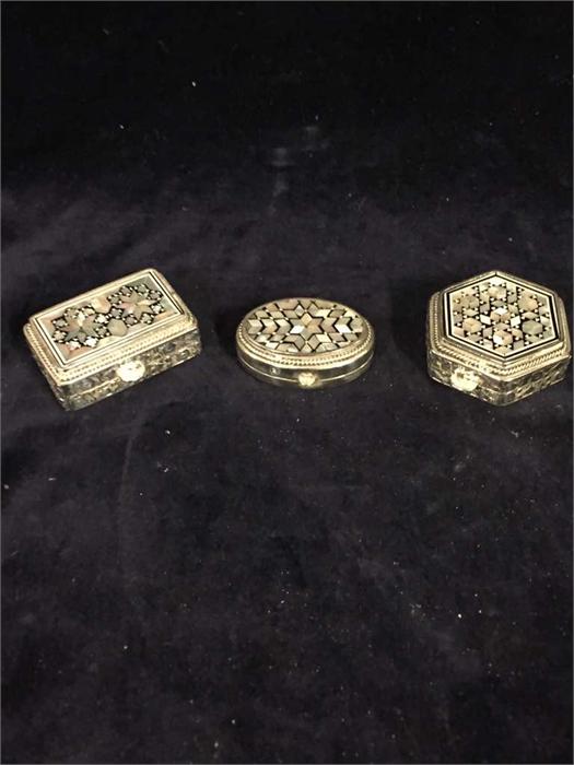 Three silver and inlay pill boxes