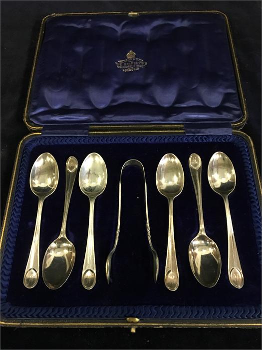 A boxed set of silver spoons