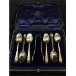 A boxed set of silver spoons