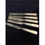 Five silver and pearl handled knives