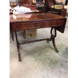 A drop leaf sofa table