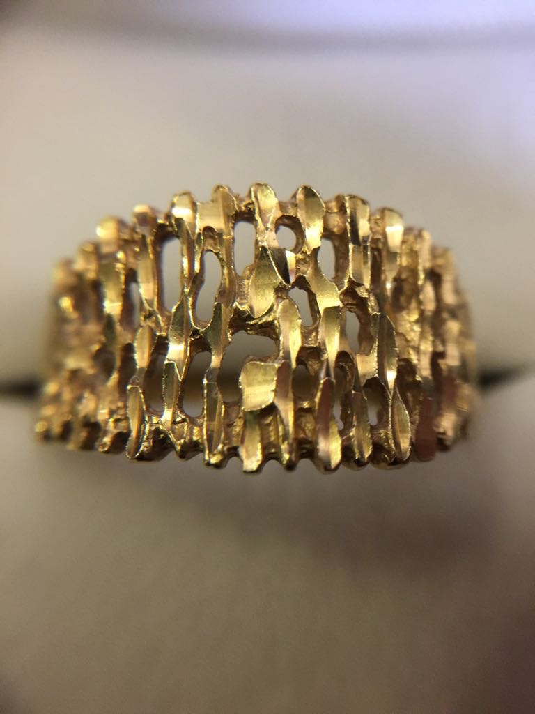 A gold ring marked 14ct