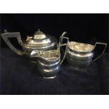 Silver tea set hallmarked Chester comprising teapot, milk jug and sugar bowl (627g)