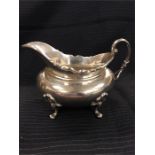 A silver sauce boat