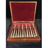 A 24 piece Hallmarked Georgian Silver canteen of cutlery in Mahogany Box