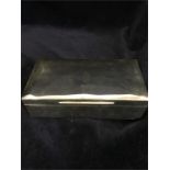 A large silver cigarette box