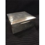 A silver cigarette box