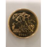 A 2000 Five pound gold coin