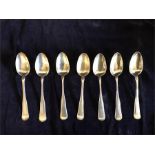 A set of seven silver spoons