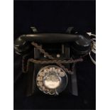 A converted vintage Bakerlite telephone