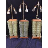 A set of Oriental cast iron lamp bases (shades available for recovering)