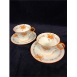 A pair of Shelley teacups and saucers