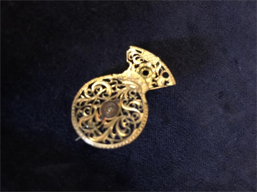 A Victorian brooch comprising a Georgian gilt metal verge pocket watch balance cock set with a - Image 2 of 4