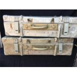 A pair of metal suitcases, made immediately after WWII.