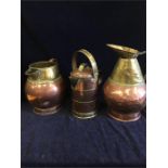 Three copper and brass jugs