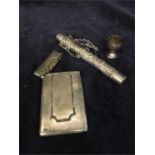A selection of silver items including a card case