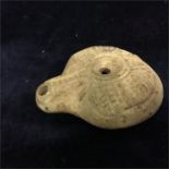 An Ancient Egyptian lamp recovered in 1862, see rear label for details