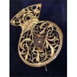 A Victorian brooch comprising a Georgian gilt metal verge pocket watch balance cock set with a
