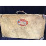 A Vintage suitcase with MB initials and Cunard labels