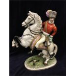 A Capodimonte figure of a mounted Napoleonic cavalry officer